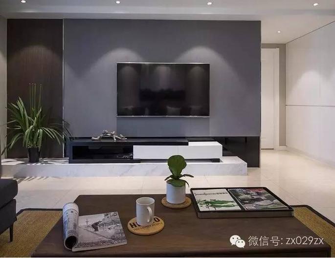电视墙深色变色处理,石材地台搭配黑白电视柜